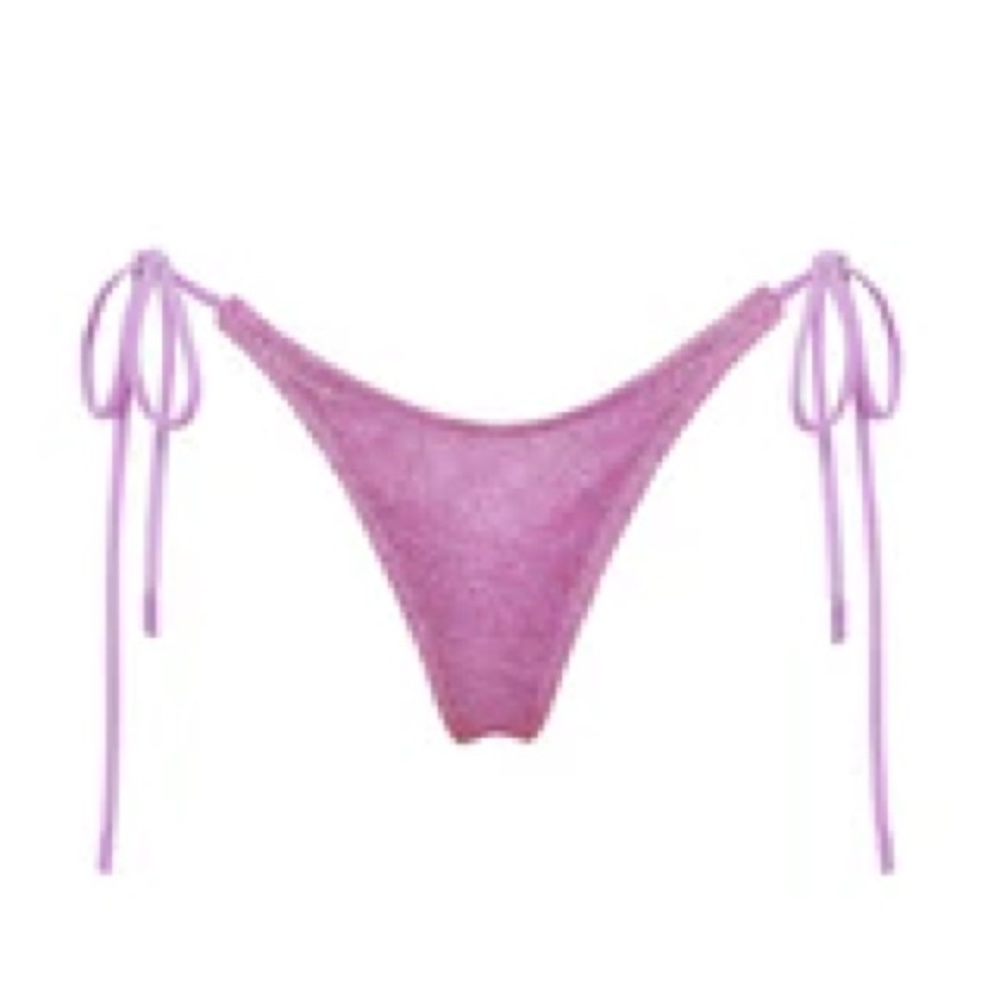 Not sure why the online pic is blurry
Worn maybe twice 
Purple sparkles 
Bag